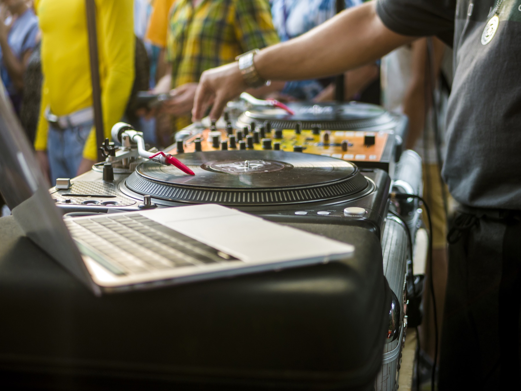 DJ working with turntables at a live set